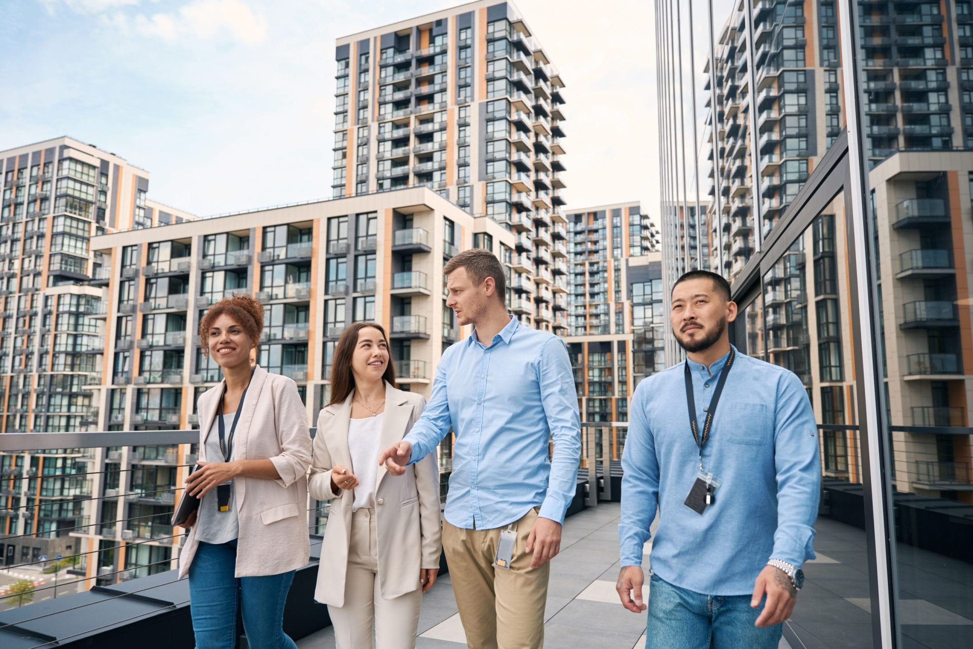Group of entrepreneurs communicating during outdoor lunchtime walk